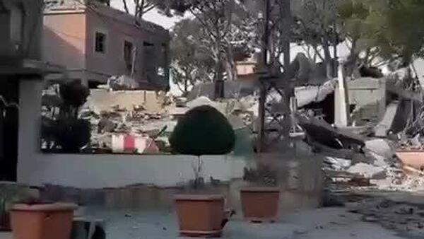 تصاویر ویرانی‌های وارد شده به ورودی زوطر شرقی در جنوب لبنان - اسپوتنیک ایران  