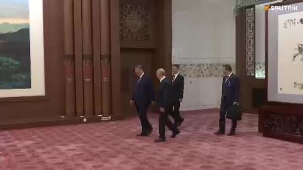 عکس گرفتن و دست دادن رهبران دو کشور روسیه و چین - اسپوتنیک ایران  