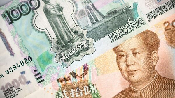 بدون سوئیفت، بدون دلار: سیستم روبل-یوان راه را برای امور مالی چندقطبی هموار میکند - اسپوتنیک ایران  