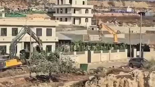 بولدوزرهای اسرائیلی خانه فلسطینی را در کرانه باختری تخریب کردند - اسپوتنیک ایران  