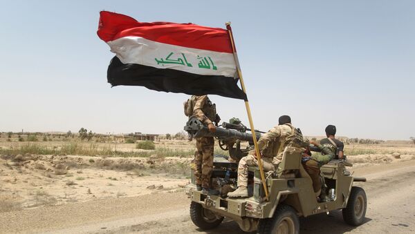 Бойцы Народного ополчения Ирака патрулируют район к западу от Багдада - اسپوتنیک ایران  