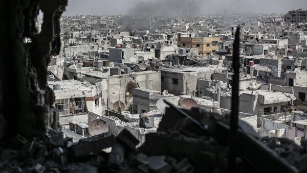 خروج شبه نظامیان از منطقه الوعر حمص در سوریه - اسپوتنیک ایران  