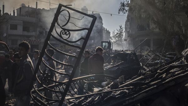Завалы на месте теракта в Хомсе - اسپوتنیک ایران  