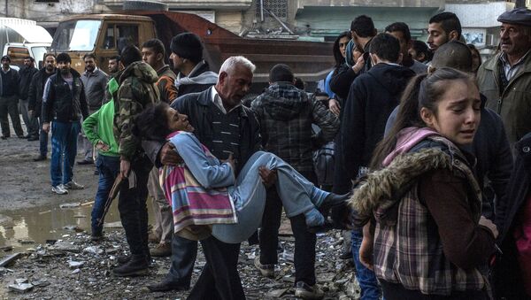 Пострадавшие во время террористического акта в центре города Хомс - اسپوتنیک ایران  