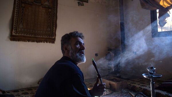 Беженец в районе Ярмук в Дамаске - اسپوتنیک ایران  
