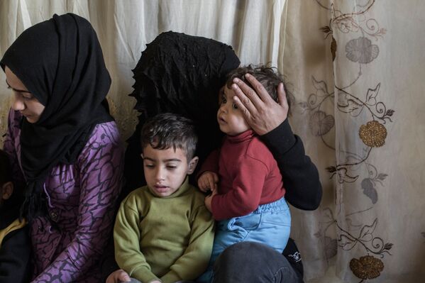 پناهندگان به منطقه یرموک در دمشق - اسپوتنیک ایران  