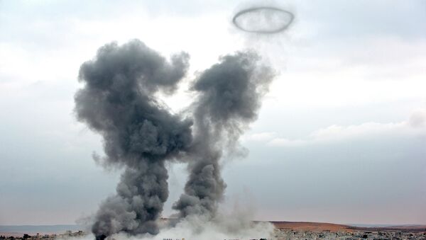 Smoke rises from the Syrian city of Kobani - اسپوتنیک ایران  