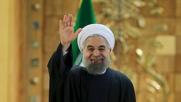 Iranian President Hassan Rouhani waves during a news conference in Tehran, Iran January 17, 2016. - اسپوتنیک ایران  
