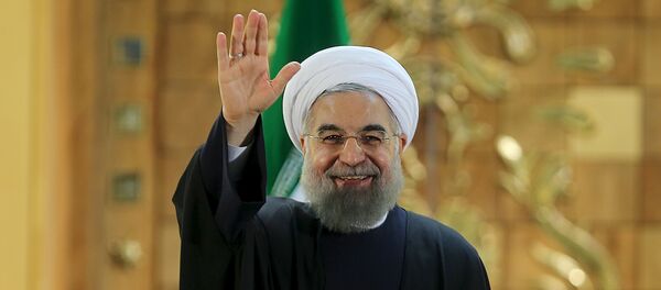 Iranian President Hassan Rouhani waves during a news conference in Tehran, Iran January 17, 2016. - اسپوتنیک ایران  
