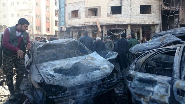 صورة أرشيفية لتفجير سيار مفخخة في حي السيدة زينب جنوب دمشق - اسپوتنیک ایران  