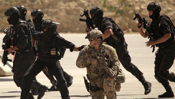 FILE - In this Thursday, June 20, 2013 photo, special operations forces from Iraq, Jordan and the U.S. conduct an exercise as part of Eager Lion multinational military maneuvers at the King Abdullah Special Operations Training Center (KASOTC) in Amman, Jordan - اسپوتنیک ایران  