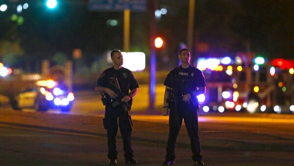 Police officers block an intersection near the Curtis Culwell Center after a shooting outside the Muhammad Art Exhibit and Contest, sponsored by the American Freedom Defense Initiative which was being held at the facility in Garland, Texas May 3, 2015. - اسپوتنیک ایران  