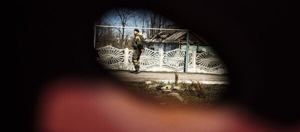 Ополченцы в селе Спартак недалеко от аэропорта Донецка Ополченцы в селе Спартак недалеко от аэропорта Донецка - اسپوتنیک ایران