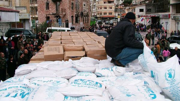 Российская гуманитарная помощь доставлена в город Кесаб в сирийской Латакии - اسپوتنیک ایران  