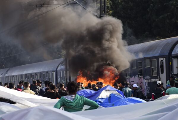 آتش سوزی در اردوگاه پناهجویان در یونان - اسپوتنیک ایران  