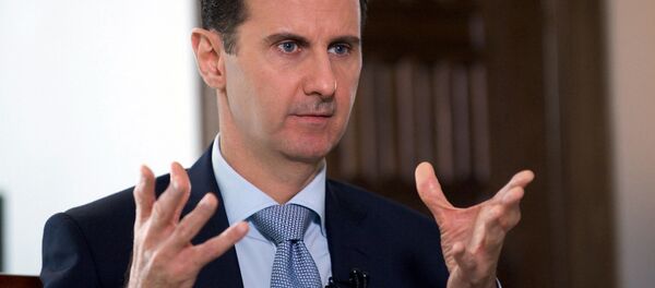 Президент Сирии Башар Асад во время интервью с Дмитрием Киселевым - اسپوتنیک ایران  