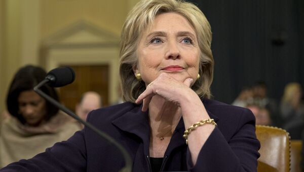 Democratic presidential candidate and former Secretary of State Hillary Rodham Clinton, listens as she testifies on Capitol Hill in Washington, Thursday, Oct. 22, 2015, before the House Select Committee on Benghazi - اسپوتنیک ایران  