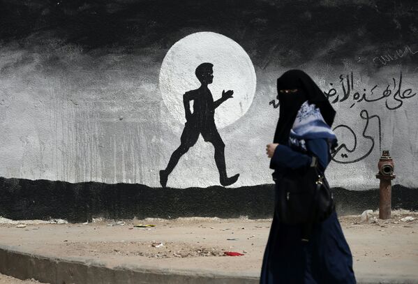 گرافیتی  روی دیواری در نوار غزه - اسپوتنیک ایران  