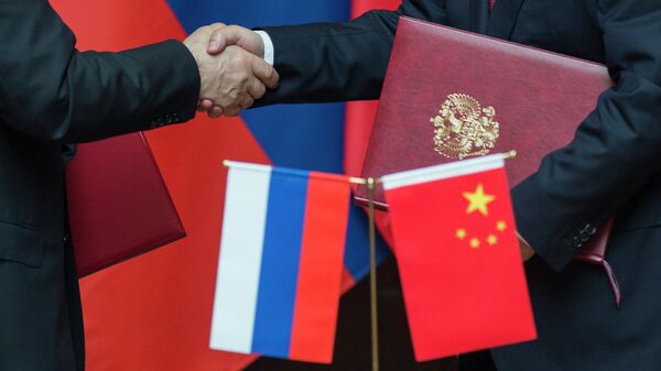 حجم مبادلات تجاری روسیه و چین رکورد زد - اسپوتنیک ایران  
