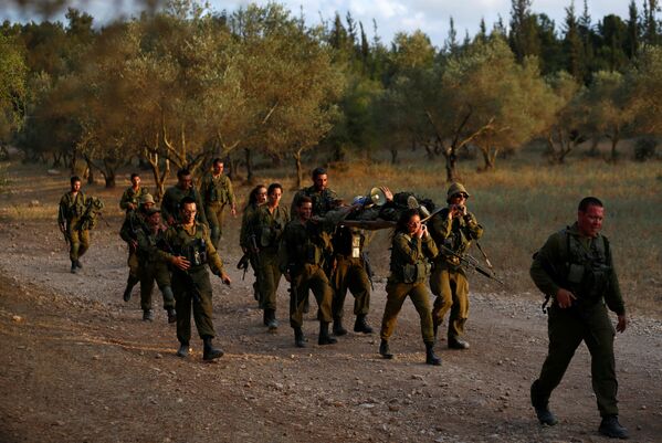 نظامیان اسرائیلی هنگام تمرینات در جنگل - اسپوتنیک ایران  