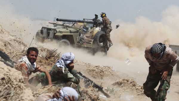 Иракские проправительственные силы во время противостояния с боевиками ИГ - اسپوتنیک ایران  