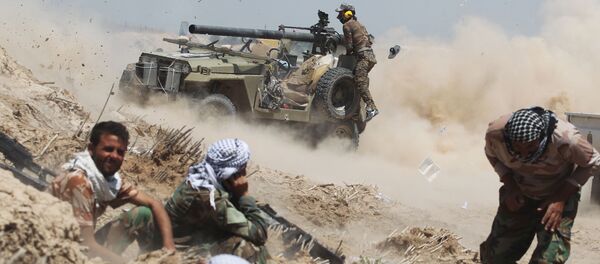 Иракские проправительственные силы во время противостояния с боевиками ИГ - اسپوتنیک ایران  