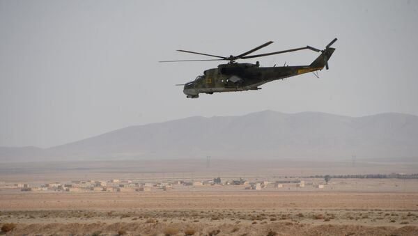 Вертолет сирийской армии в окрестностях Пальмиры в Сирии - اسپوتنیک ایران  