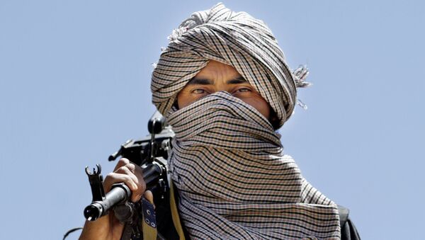 Афганский талиб с оружием - اسپوتنیک ایران  