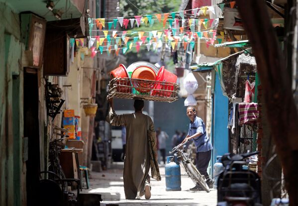 فروشنده  ظروف پلاستیکی در  قاهره قدیمی - اسپوتنیک ایران  