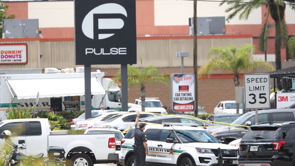 A police vehicle outside the Pulse nightclub, the scene of a mass shooting in Orlando, Florida, on June 12, 2016 - اسپوتنیک ایران  