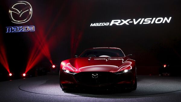 Mazda Motor Corp's RX-Vision is revealed during a presentation at the 44th Tokyo Motor Show in Tokyo - اسپوتنیک ایران  