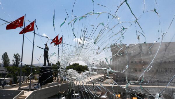 A damaged window is pictured at the police headquarters in Ankara, Turkey, July 18, 2016 - اسپوتنیک ایران  