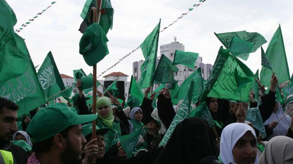 Движение ХАМАС отметило 22-летие многотысячным митингом в Газе - اسپوتنیک ایران  