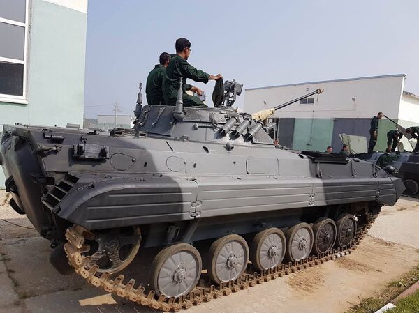 مراسم آماده سازی و سرویس دهی تجیهزات نظامی - اسپوتنیک ایران  