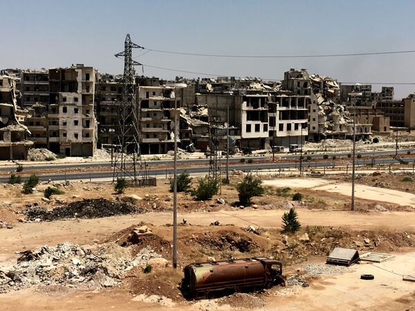 تخریب ساختمان در حلب سوریه - اسپوتنیک ایران  