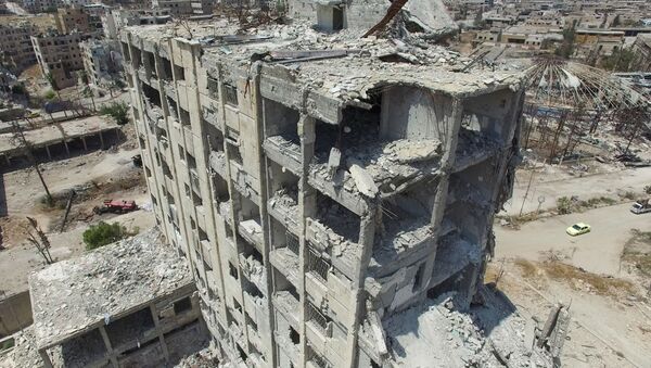 ساختمان ویران در محله بنی زید در شمال حلب - اسپوتنیک ایران  