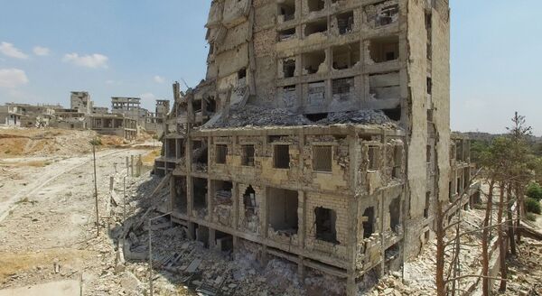 ساختمان ویران در محله بنی زید در شمال حلب - اسپوتنیک ایران  