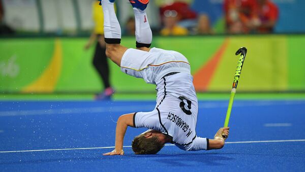 ماتس گرامبوش ورزشکار آلمانی در مسابقه هوکی روی چمن در المپیک ریو د ژانیرو - اسپوتنیک ایران  