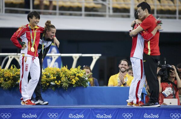 تقاضای ازدواج برنده مدال نقره از چین در پرش توی آب از ورزشکار دیگر چین در المپیک ریو د ژانیرو - اسپوتنیک ایران  
