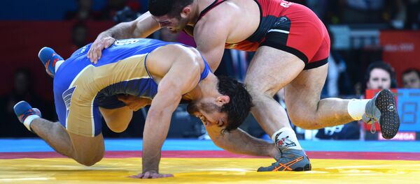 قضیه میزبانی جام‌جهانی کشتی در تهران به کجا کشیده است؟ - اسپوتنیک ایران  