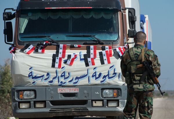 کاروان کامیون ها حامل کمک های بشردوستانه برای ساکنان سوریه - اسپوتنیک ایران  