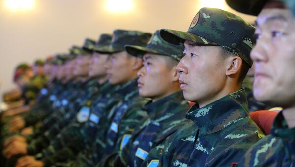 Служащие Народной вооруженной полиции Китая во время совместных тактико-специальных занятий спецназовцев Национальной гвардии России и Народной вооруженной полиции Китая Сотрудничество-2016 - اسپوتنیک ایران  