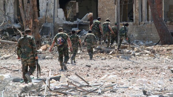 Сирийские военные на освобожденной от боевиков территории военных училищ в Алеппо - اسپوتنیک ایران  