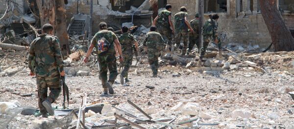 Сирийские военные на освобожденной от боевиков территории военных училищ в Алеппо - اسپوتنیک ایران  
