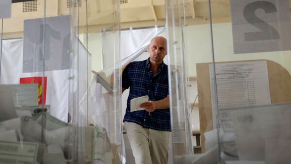 На одном из избирательных участков в Симферополе в единый день голосования - اسپوتنیک ایران  