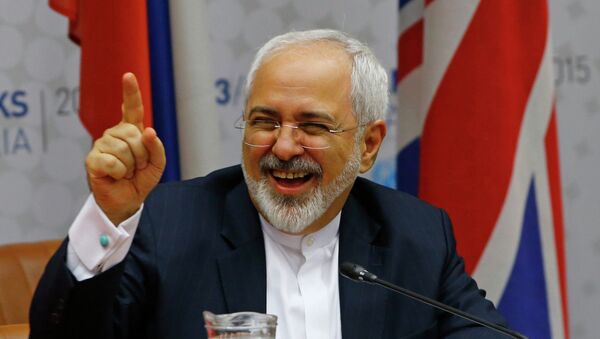 Iranian Foreign Minister Mohammad Javad Zarif reacts during a plenary session at the United Nations building in Vienna, Austria July 14, 2015 - اسپوتنیک ایران  