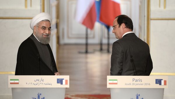 Президент Франции Франсуа Олланд и президент Ирана Хасан Роухани - اسپوتنیک ایران  