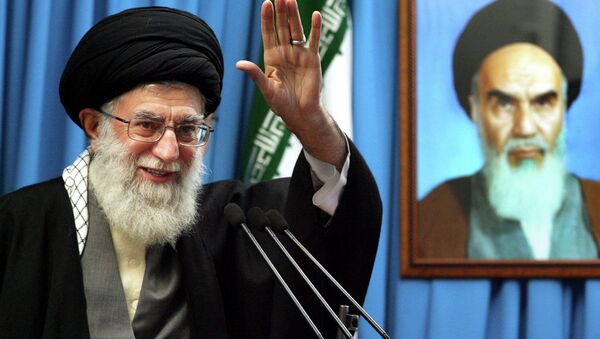 Iranian supreme leader Ayatollah Ali Khamenei waves to the worshippers. - اسپوتنیک ایران  