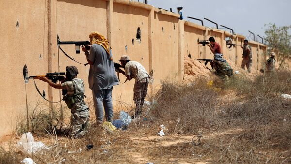 نیروهای دولتی لیبی جان 13 شهروند خارجی به گروگان گرفته شده توسط نیروهای داعش را نجات دادند - اسپوتنیک ایران  