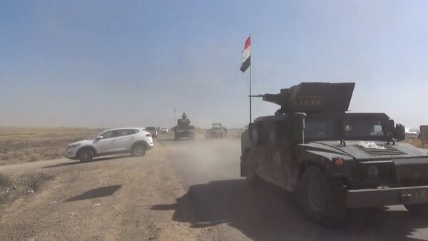حرکات ماشین های نظامی ارتش عراق در مسیر عملیات آزادسازی موصل (ویدیو) - اسپوتنیک ایران  
